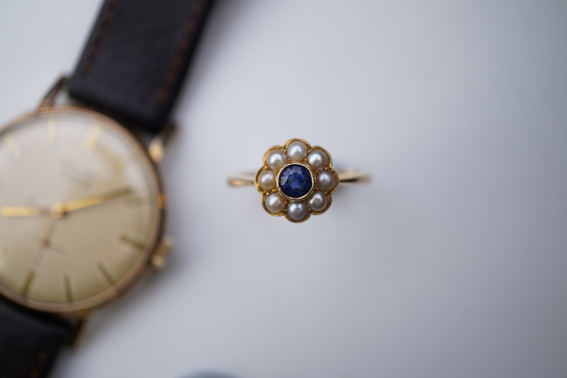 A group of jewellery and two watches